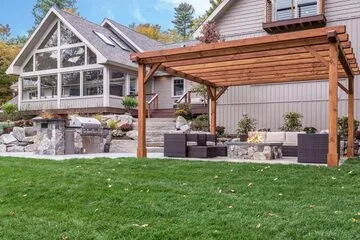 A beautiful outdoor pergola provides a modern and useful outdoor living space NY